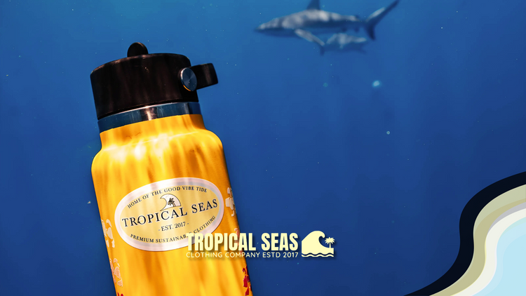 Eco-friendly accessories collection at Tropical Seas Clothing featuring a reusable water bottle with ocean-inspired design, perfect for sustainable beach and travel essentials.