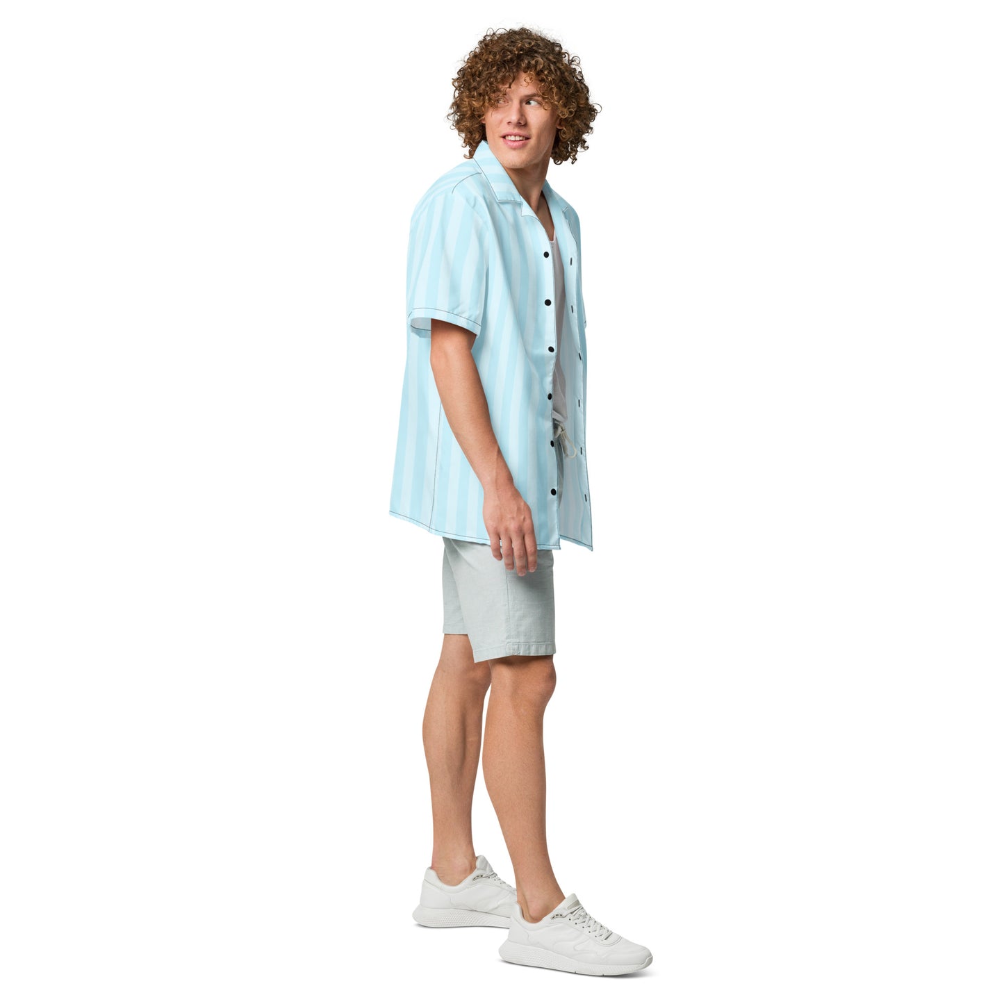 Male model wearing Tropical Seas Clothing Bahama Breeze Hawaiian shirt in light blue, styled with beach shorts – Ideal for tropical vacations and summer wear.