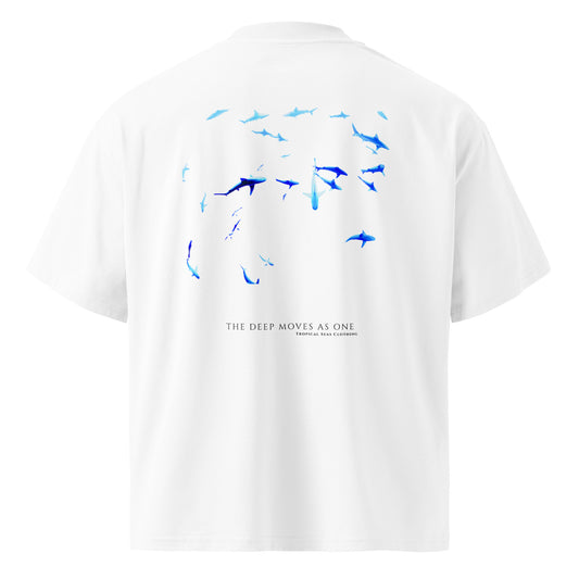 Back view of the School of Sharks T-shirt showing dozens of sharks scattered in monochrome blue and The Deep Moves As One wordmark